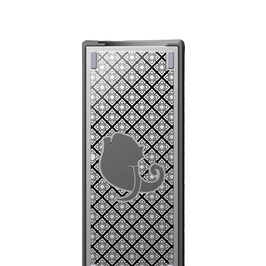 Decorative metal box with intricate patterns and an elephant emblem on a white background