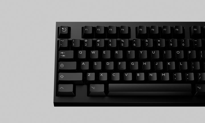 Black keyboard on a gray background