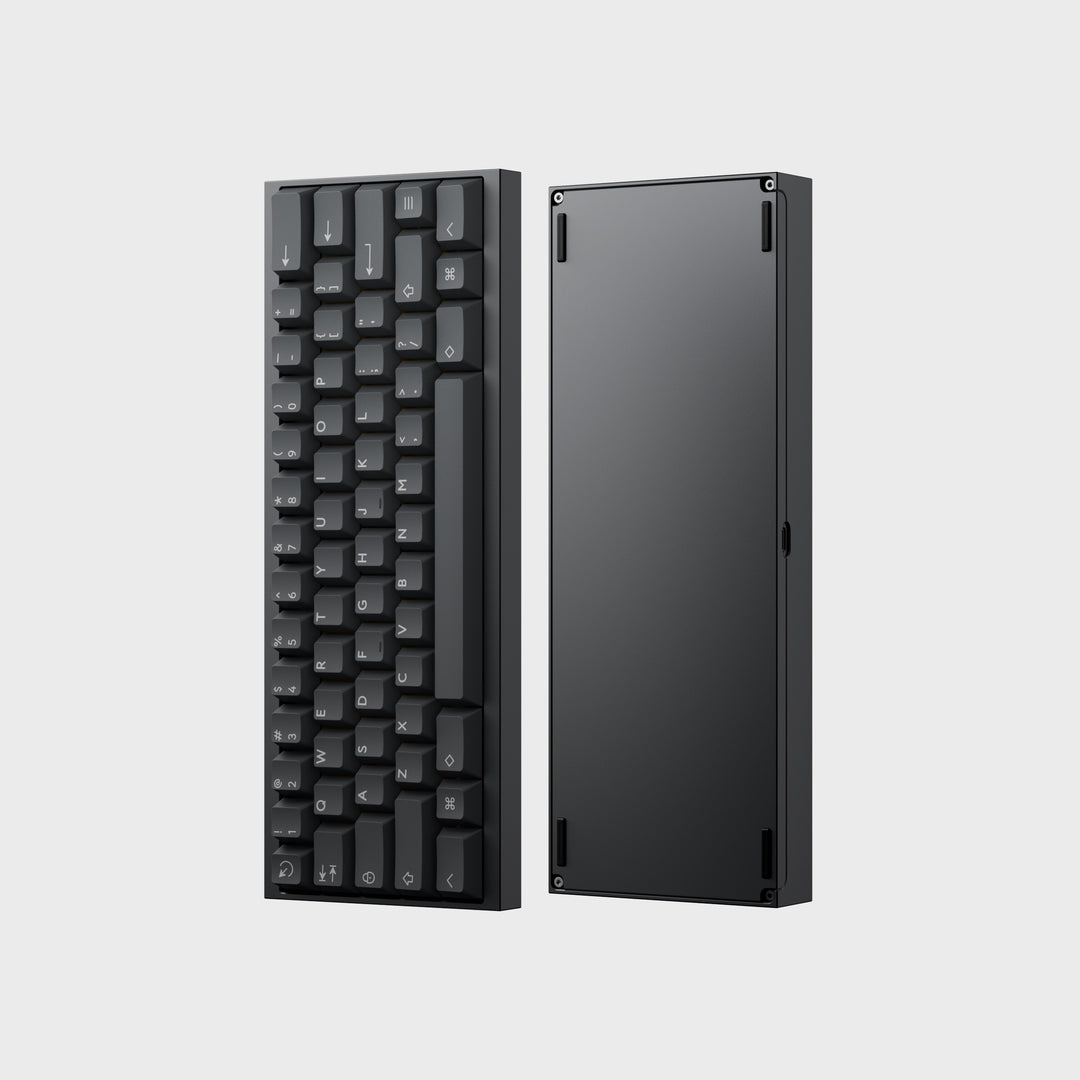 Black mechanical keyboard with a separate base on a light gray background