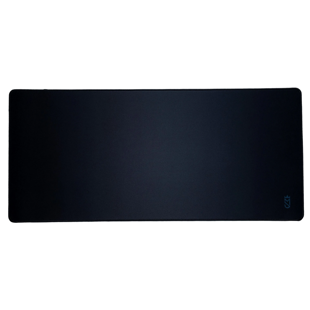 Black desk mat with a brand logo on a white background